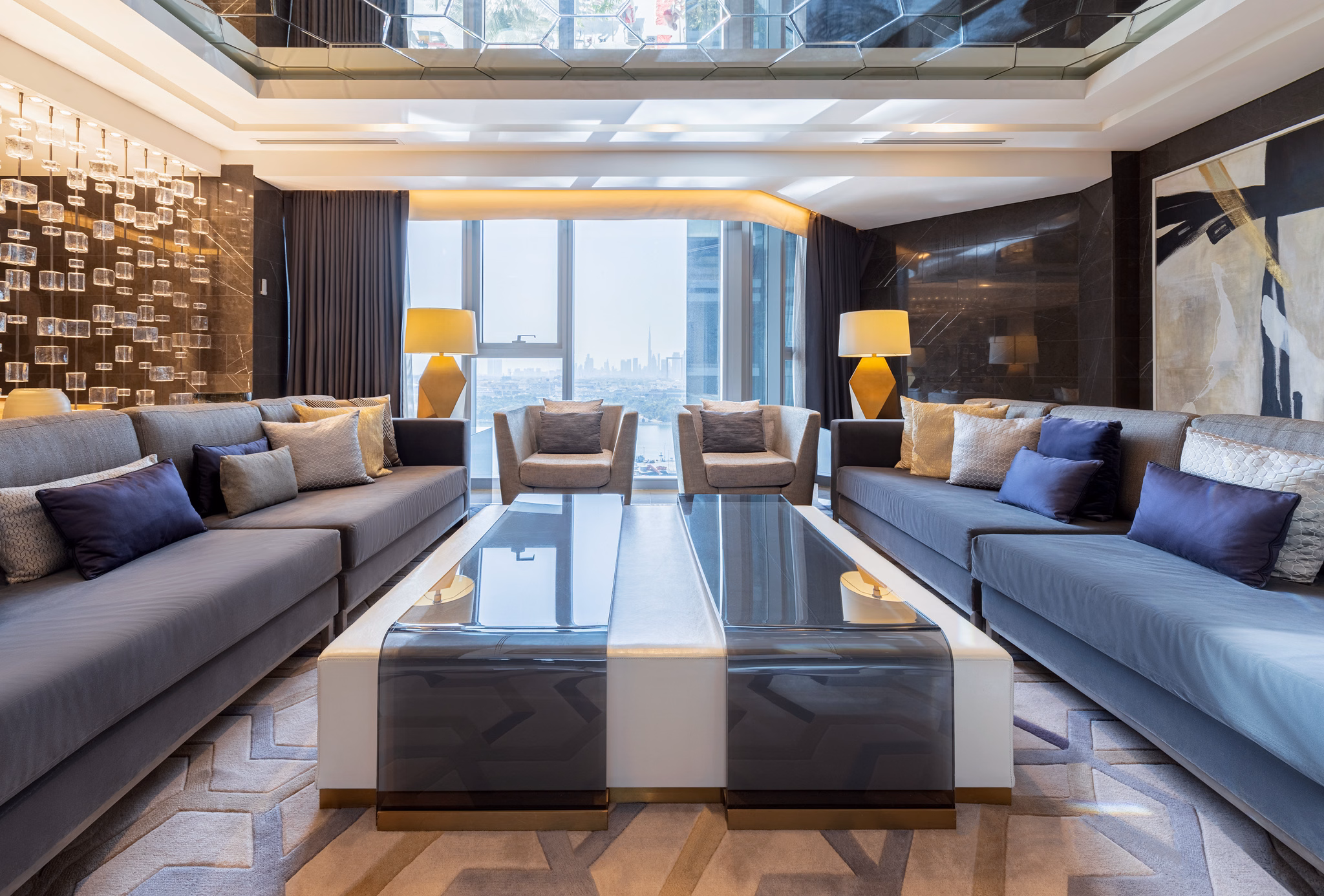 Marble kitchenette with bar stools at Al Bandar Rotana in Dubai Creek, UAE