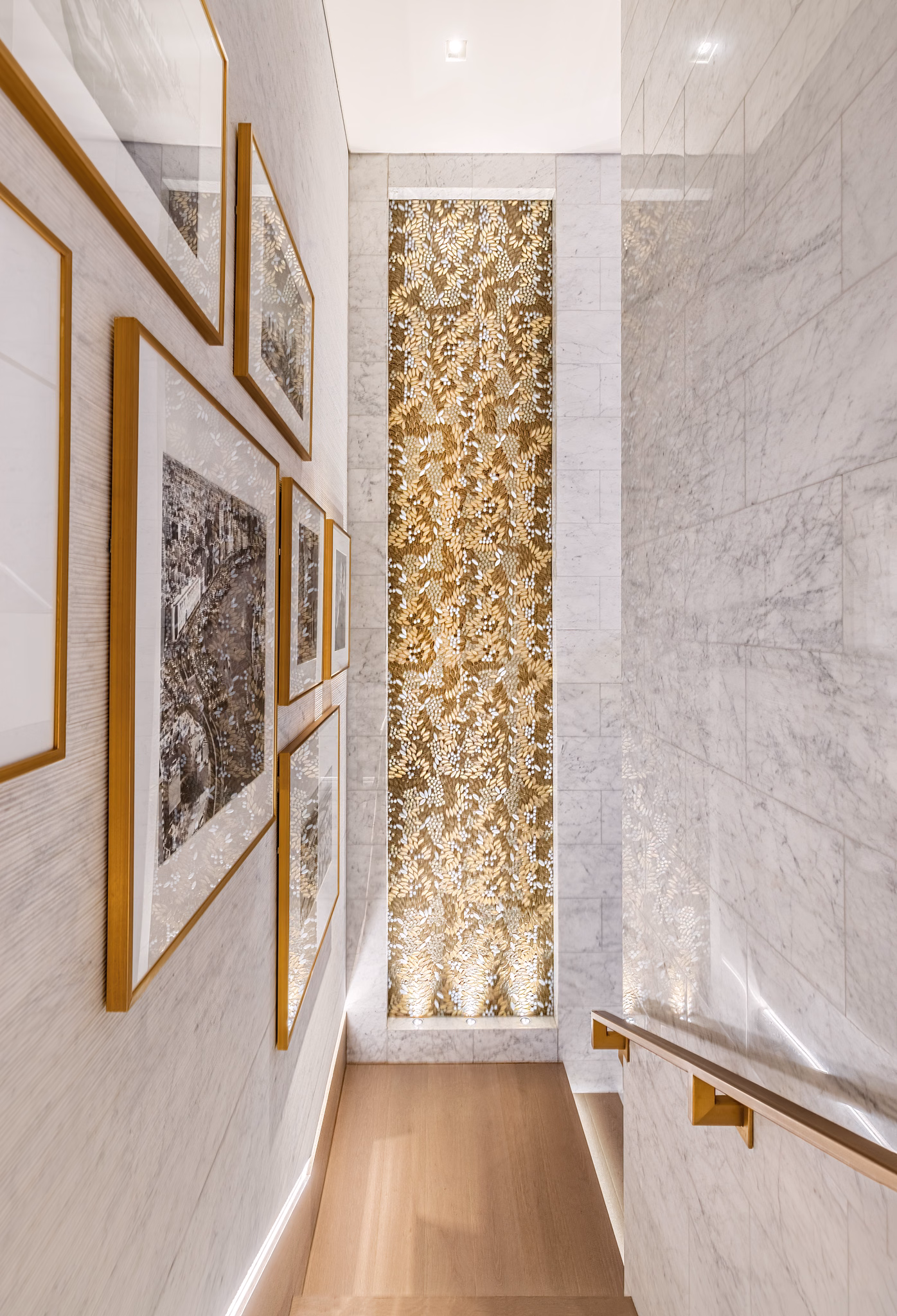 Stone stair landing with brass handrail at Al Bandar Rotana in Dubai Creek, UAE
