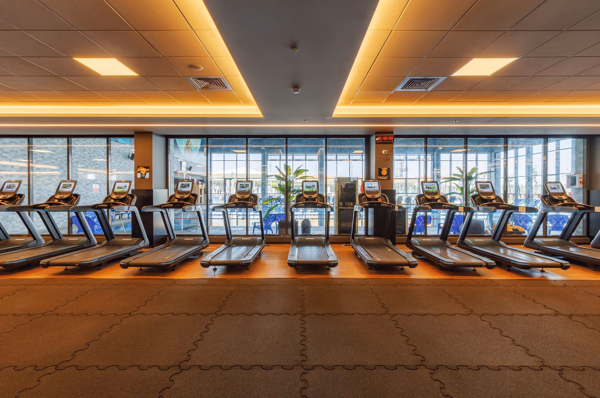 Treadmill studio overlooking the city at Holmes Place Kfar Saba in Kfar Saba, Israel