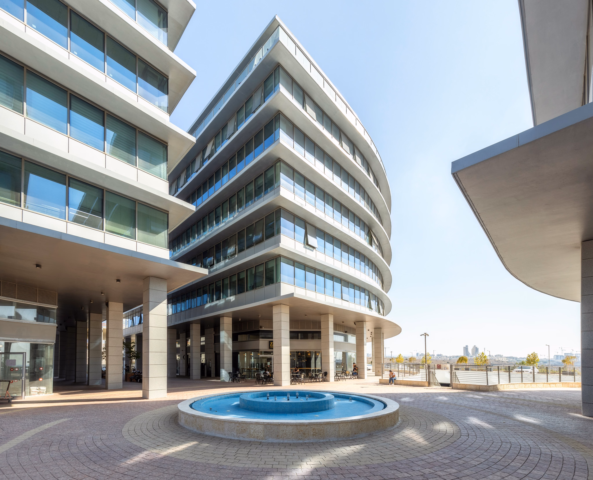 Commercial courtyard with circular fountain at Platinum Four in Modi'in, Israel