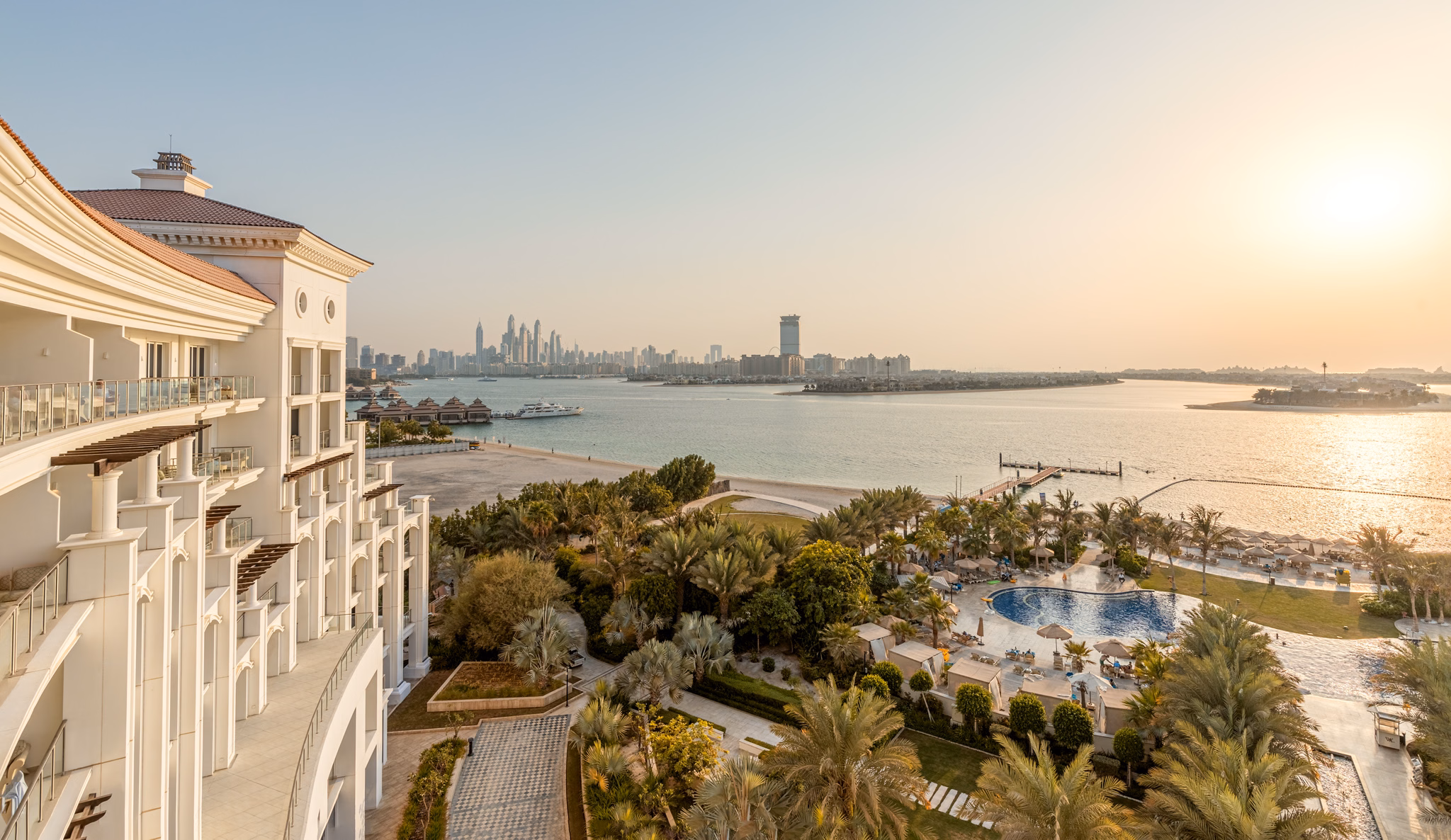 Elevated view across the resort toward Dubai Marina at Waldorf Astoria Dubai Palm Jumeirah in Dubai, UAE
